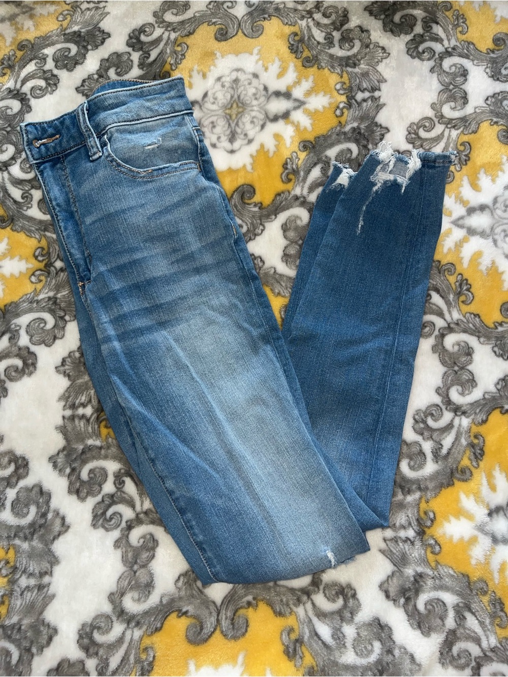 American Eagle Outfitters Light Blue Skinny Jeans with Frayed Hem